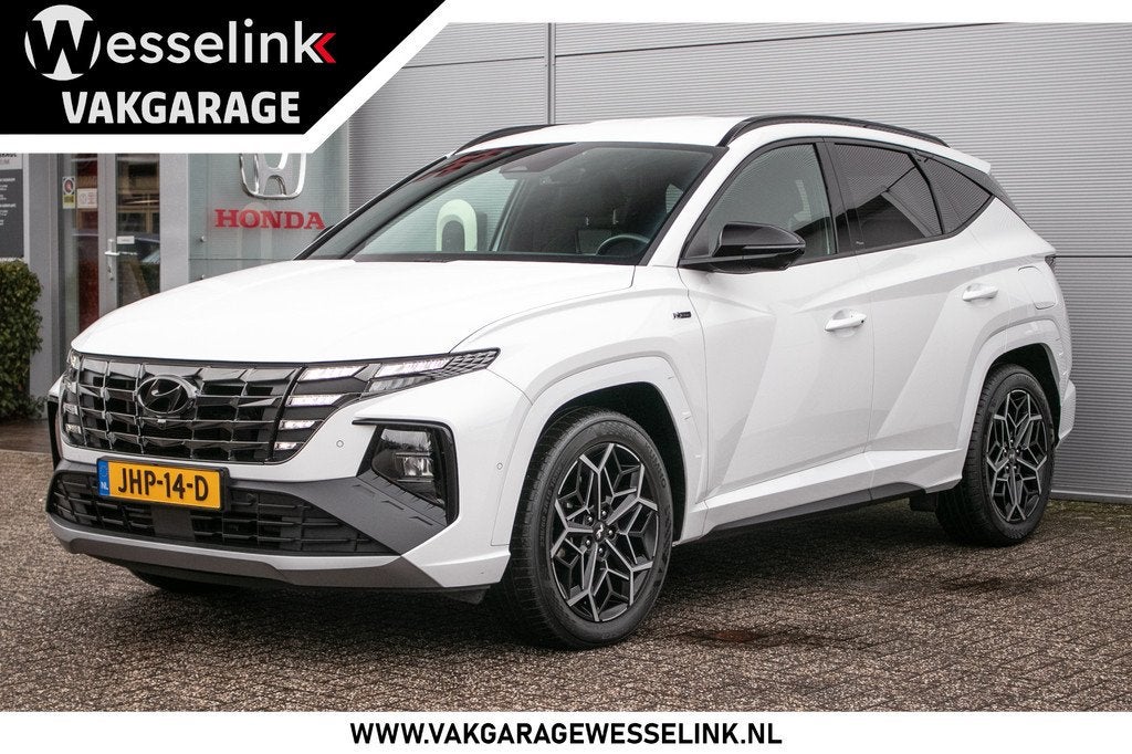 Hyundai Tucson 1.6 T-GDI PHEV N Line 4WD | Stoelverw.+vent., Auto's, Hyundai, Gebruikt, Euro 6, 4 cilinders, Leder en Stof
