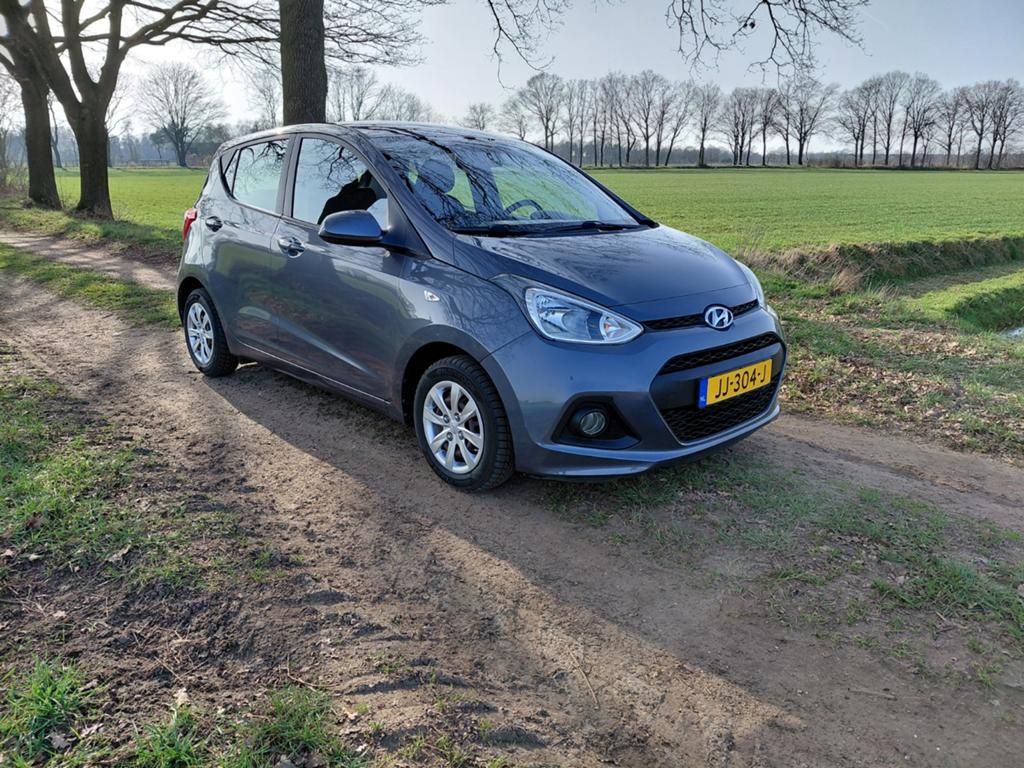 Hyundai i10 1.0i 66pk 2016 Grijs, Auto's, 31 €/maand, 4 stoelen, 23 km/l, Origineel Nederlands