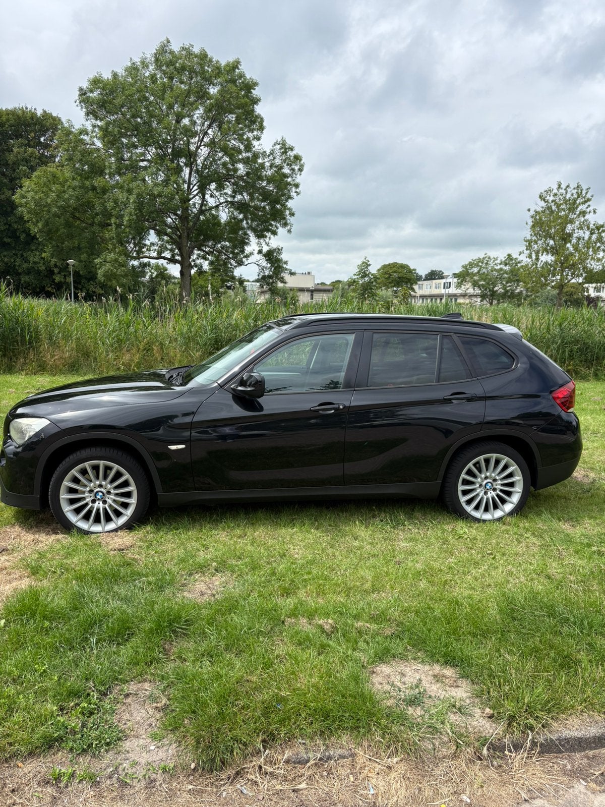 BMW X1 2.0 Xdrive 20I AUT 2012 Zwart, Auto's, Zwart, 4 cilinders, 2000 kg, Zwart