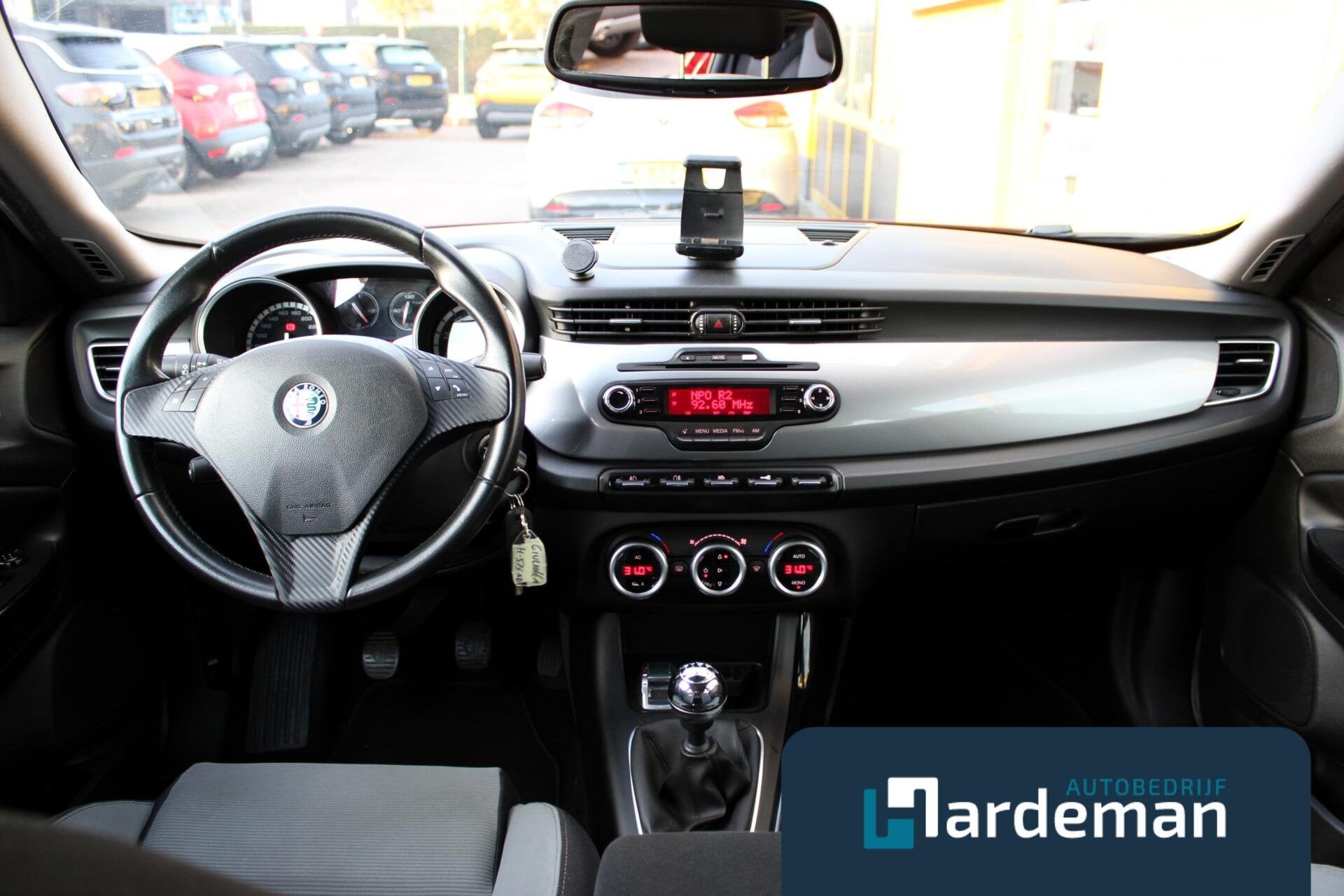 Alfa Romeo Giulietta 1.4 T Distinctive Clima Cruise, Auto's, Euro 5, Stof, Gebruikt, 4 cilinders