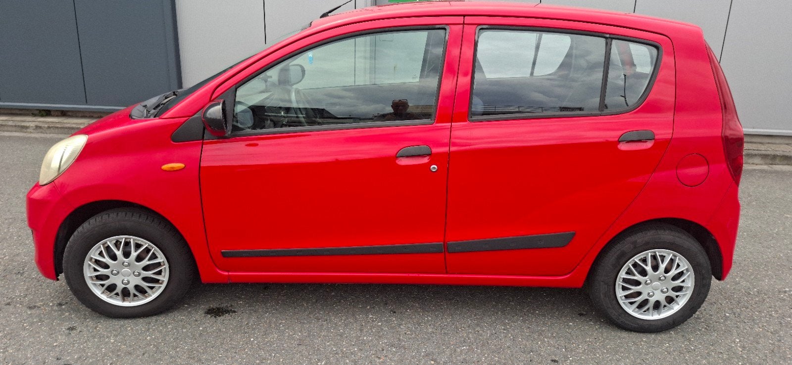 Daihatsu Cuore 1.0 5D 2008 Rood, Auto's, Voorwielaandrijving, Stof, 600 kg, 18 €/maand