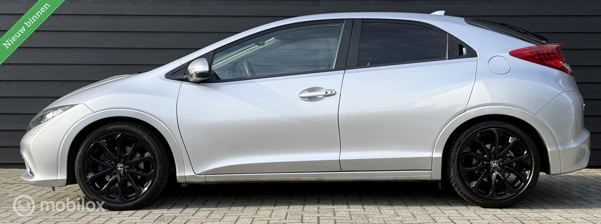 Honda Civic 1.8 Sport Pano.dak/Winterpakket/Leder/Clima/Crui, Gebruikt, 4 cilinders, Met garantie (alle), Origineel Nederlands