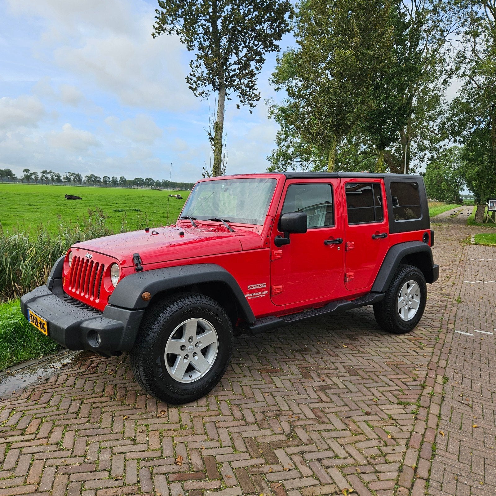 Jeep Wrangler 2.8 CRD Unlimited AUT 2008 Rood, Auto's, Automaat, Stof, 4 cilinders, 241 €/maand