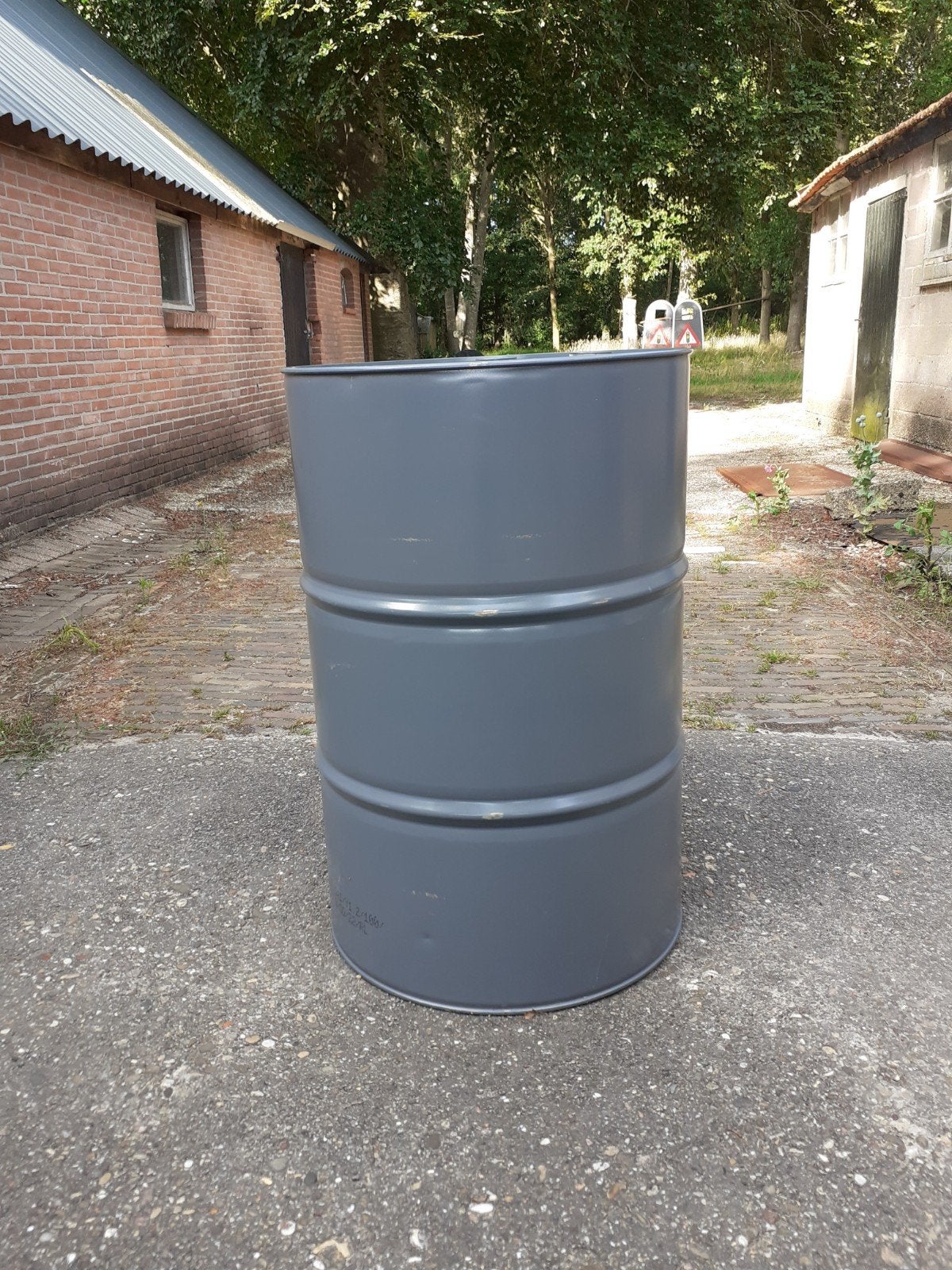 Schone stalen 200 liter vaten, Ophalen