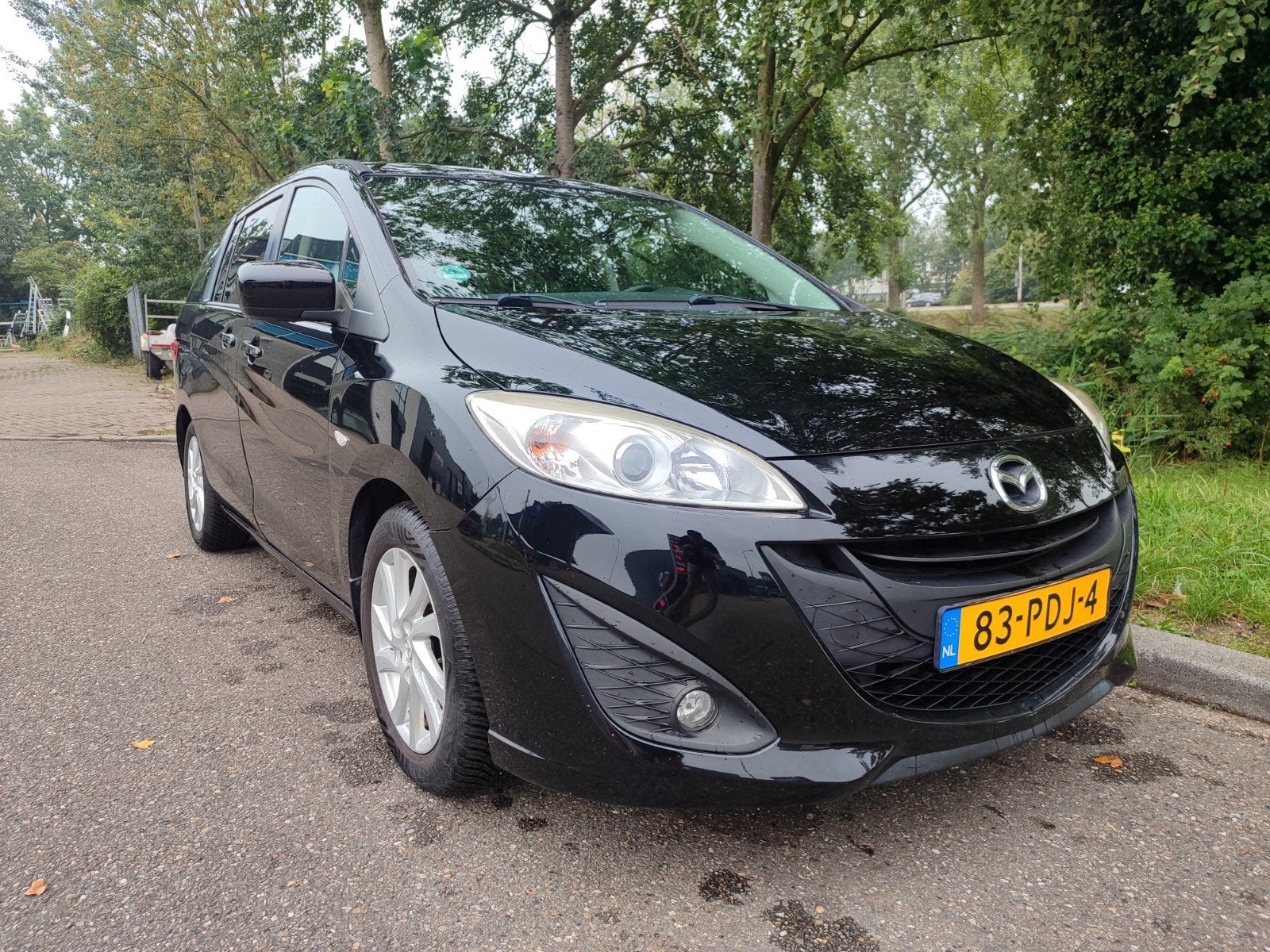 Mazda 5 1.8 115pk 2011 Zwart 7 persoons, Voorwielaandrijving, Stof, 4 cilinders, 7 stoelen