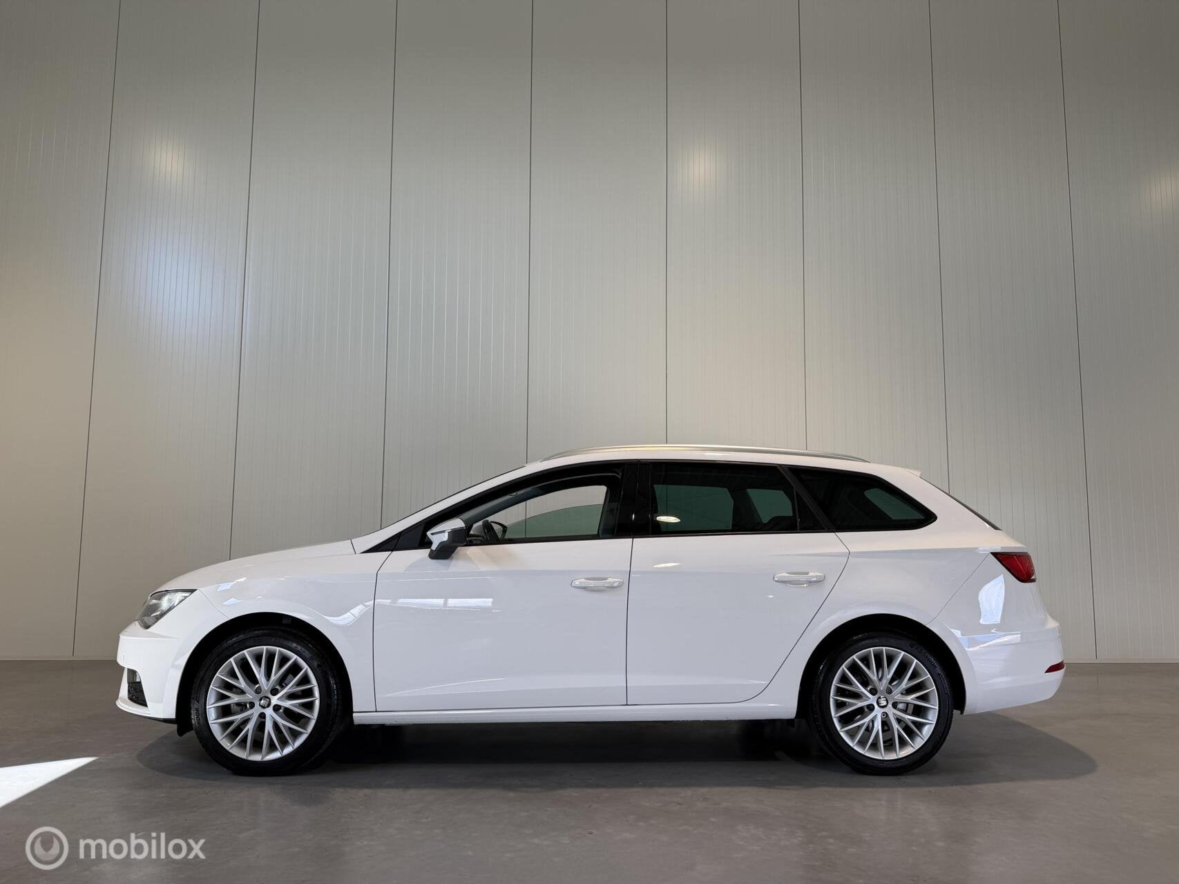 Seat Leon ST 1.0 EcoTSI Style Business Intense, Navigatie|Ca, Auto's, Voorwielaandrijving, Stof, Gebruikt, Leon