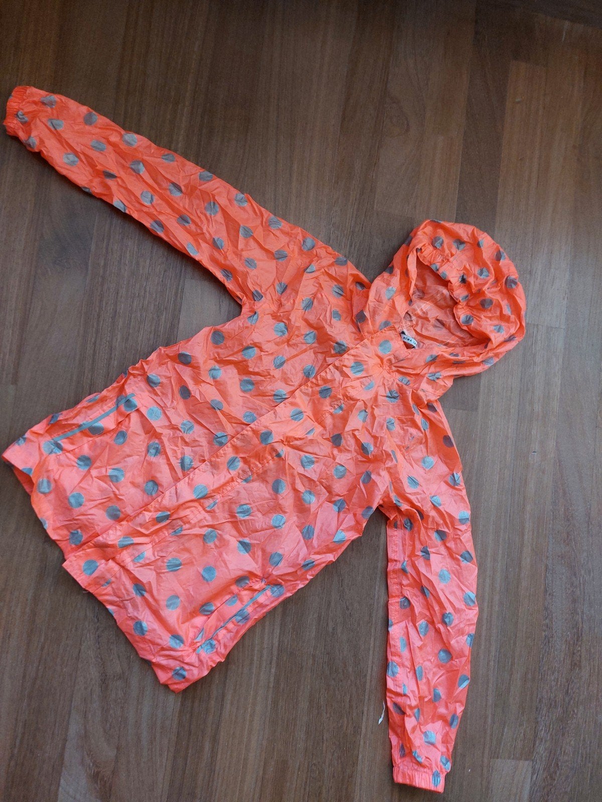 HEMA regenjas 146/162 - Oranje/perzik met stippen polkadot, Ophalen of Verzenden, Zo goed als nieuw, HEMA, Meisje