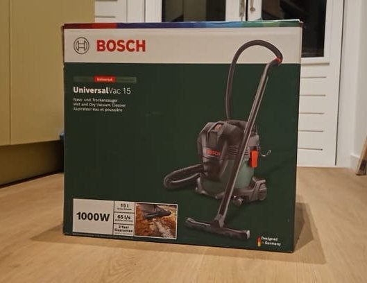 Bouwstofzuiger Bosch UniversalVac 15 Nat- en Droog (1000W), Ophalen, Inclusief accessoires, Bosch, Zo goed als nieuw