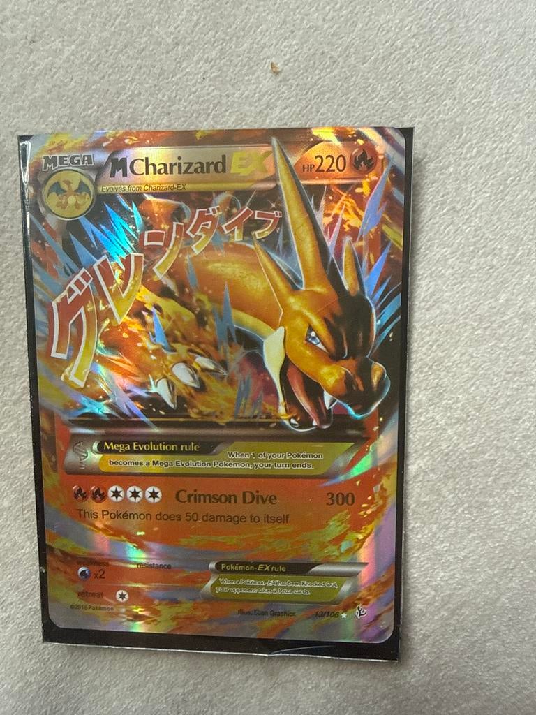 Pokémon M Charizard EX 13/106 Holo Foil Kaart, Hobby en Vrije tijd, Verzamelkaartspellen | Pokémon, Ophalen of Verzenden, Zo goed als nieuw