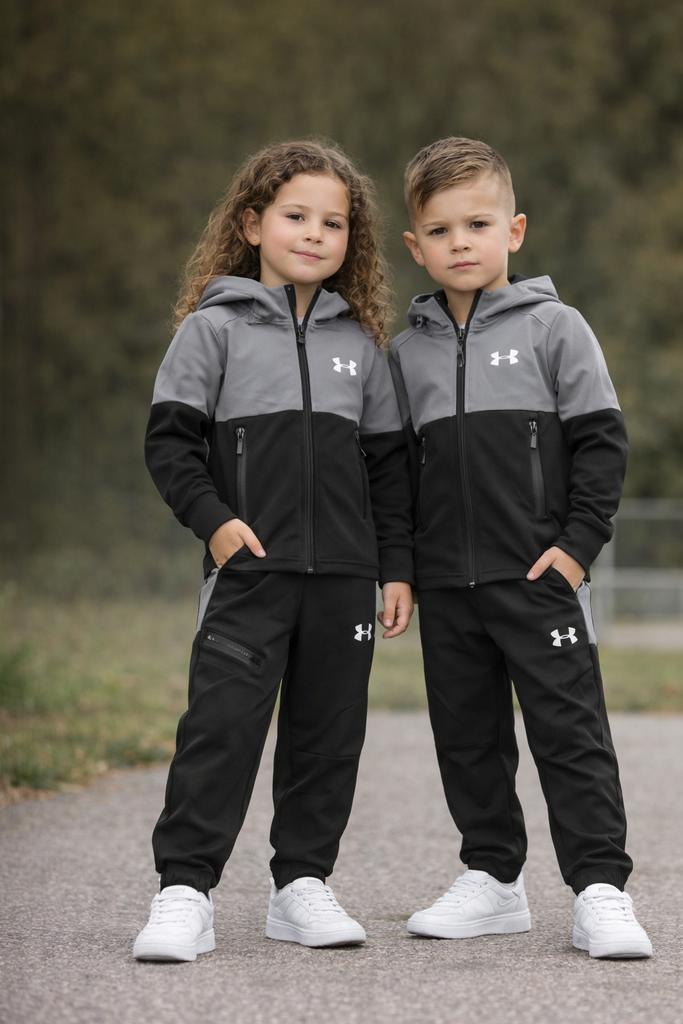 Under Armour kinderpak grijs/zwart, Kinderen en Baby's, Kinderkleding | Overige, Gebruikt, Jongen of Meisje, Ophalen of Verzenden