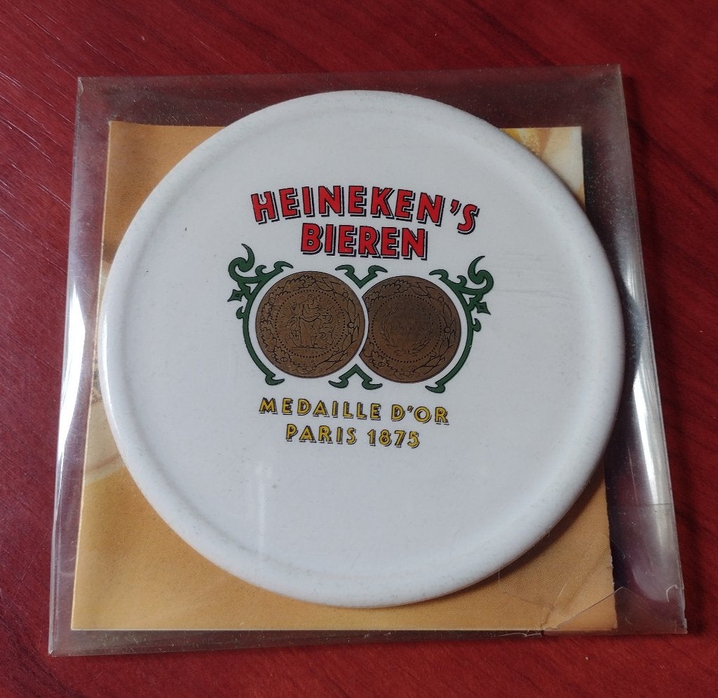 Heineken Vintage Coaster Porselein ‘70’s. (A2), Verzamelen, Ophalen of Verzenden, Nieuw, Viltje(s), Heineken