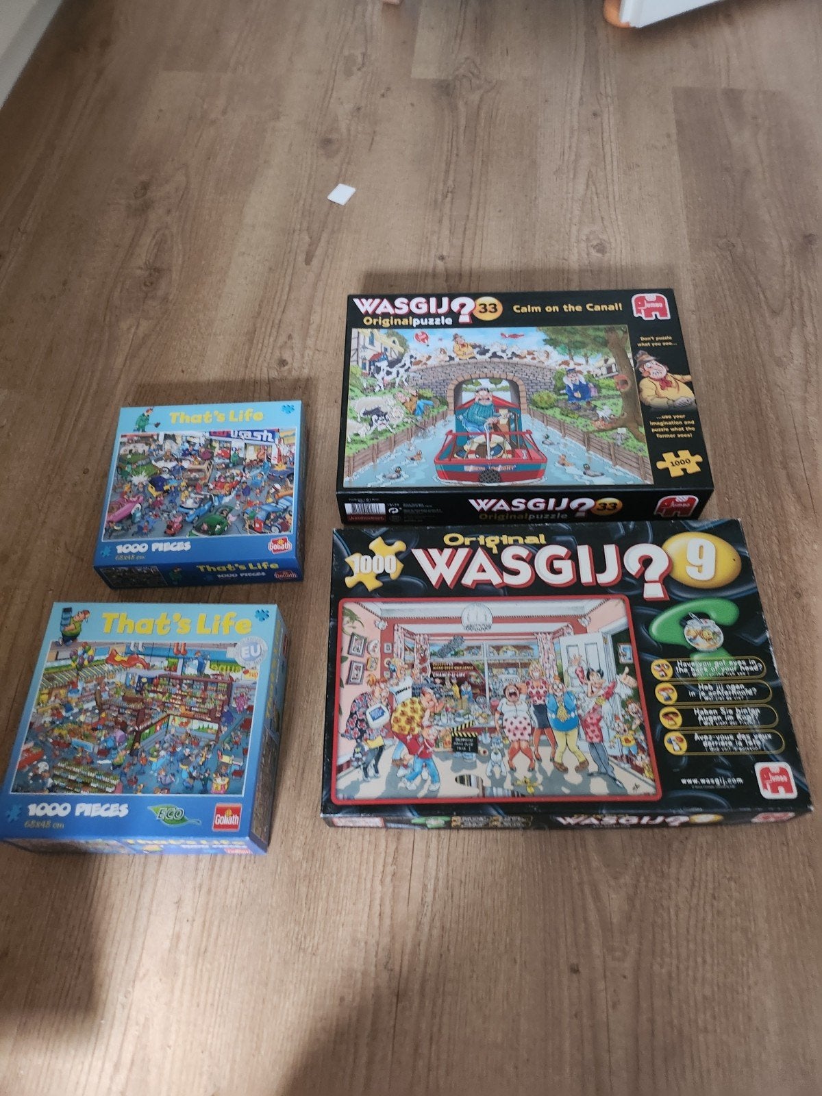 4 puzzels: 2 Wasgij (1000) en 2 That's Life (1000), Ophalen of Verzenden, 500 t/m 1500 stukjes, Gebruikt, Legpuzzel