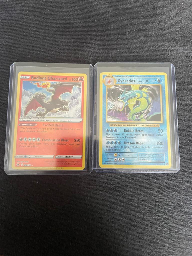 Radiant Charizard #020 & Gyarados #032, Hobby en Vrije tijd, Verzamelkaartspellen | Pokémon, Ophalen of Verzenden, Nieuw, Meerdere kaarten