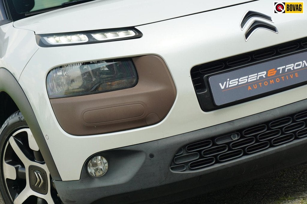 Citroen C4 Cactus 1.2 e-THP 110pk Shine - Blanc Nacré - Hab, Auto's, Voorwielaandrijving, Gebruikt, 995 kg, Leder