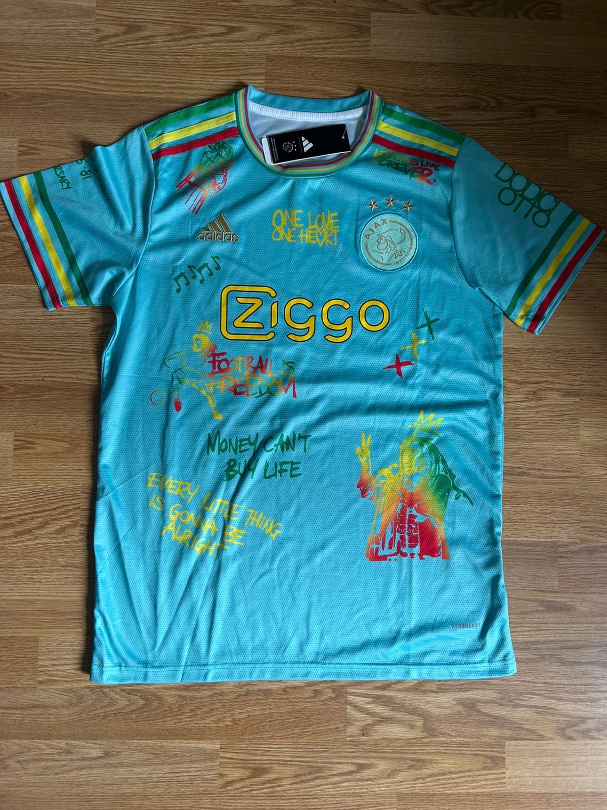 SPECIAL EDITION Bob Marley Ajax shirt -GRATIS VERZENDING DHL, Verzenden, Nieuw, Maat 52/54 (L), Blauw