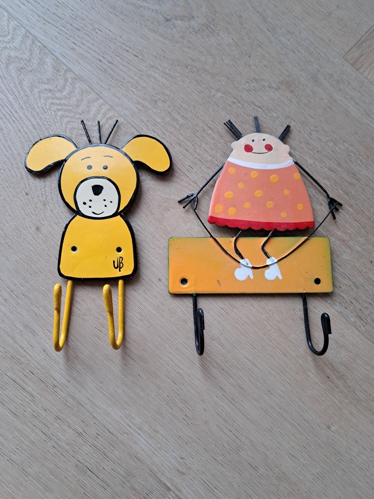 Leuke metalen kinderkapstokjes/haakjes: hond en meisje, Ophalen of Verzenden, Zo goed als nieuw, Handgemaakt, Kapstokje