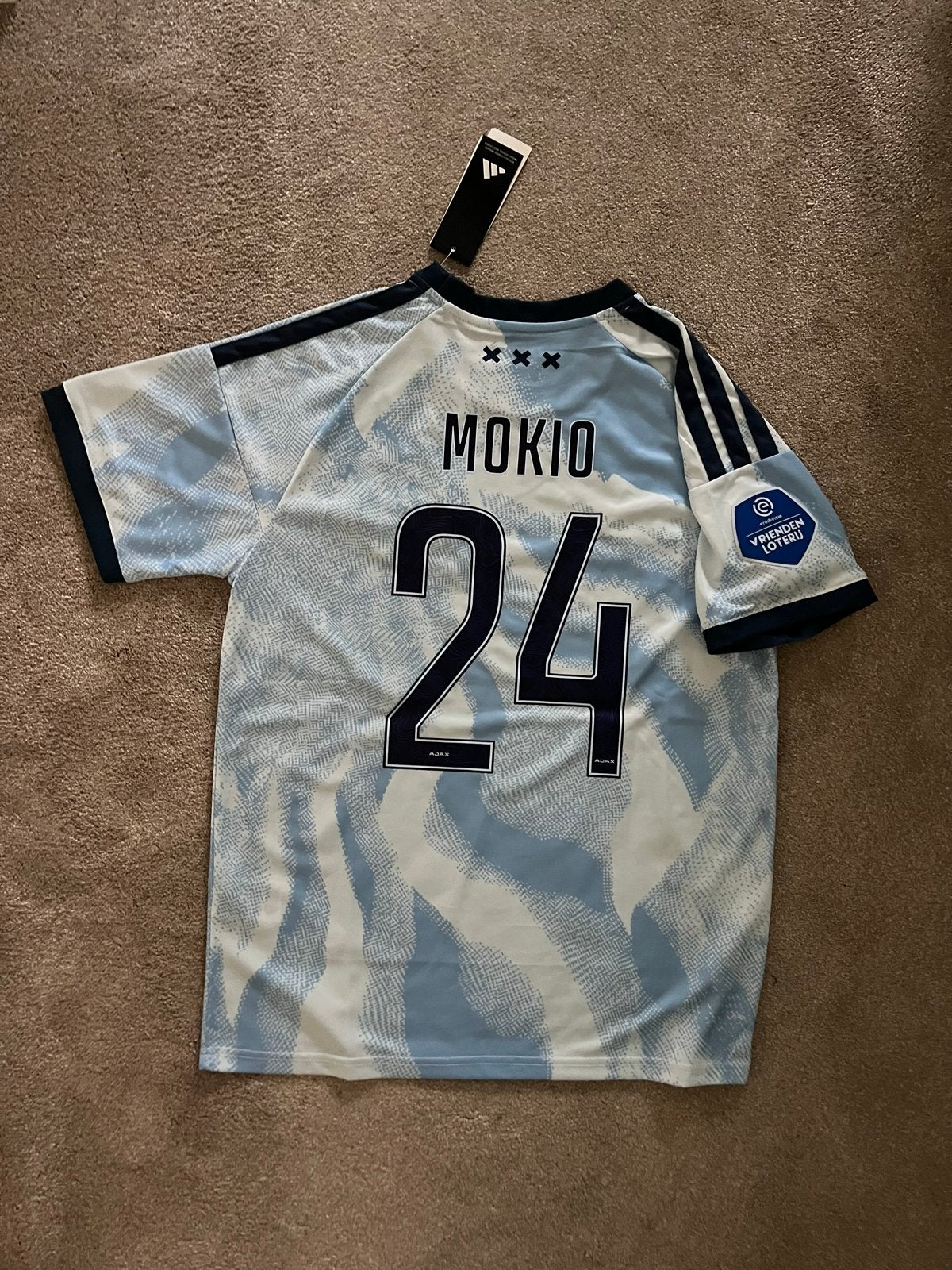 Ajax uitshirt 2026/27 Mokio 24 - Maat M - Nieuw, Sport en Fitness, Maat M, Ophalen of Verzenden, Nieuw, Shirt