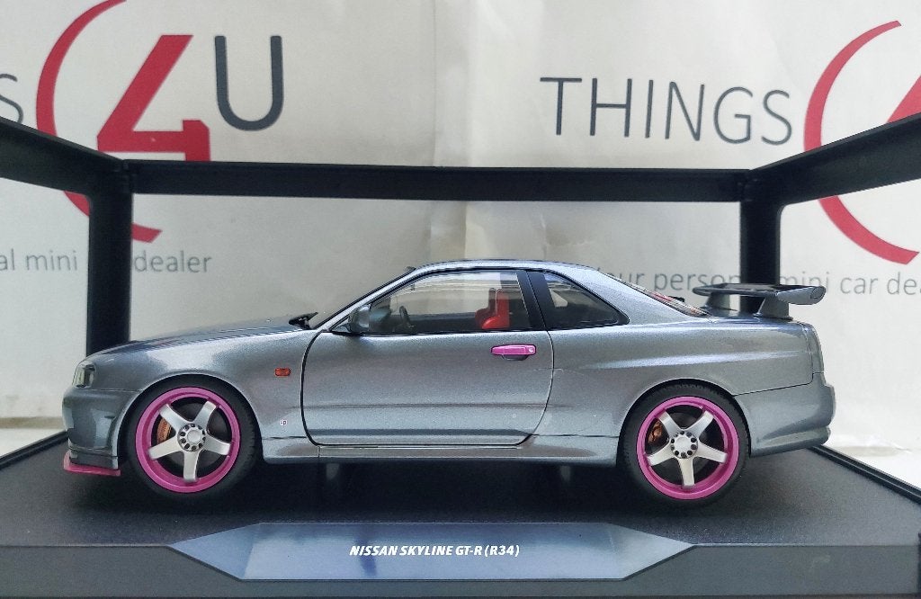 Solido 1:18 Nissan Skyline GT-R R34 1999 grijs metallic/roze, Ophalen of Verzenden, Nieuw, Auto, Solido