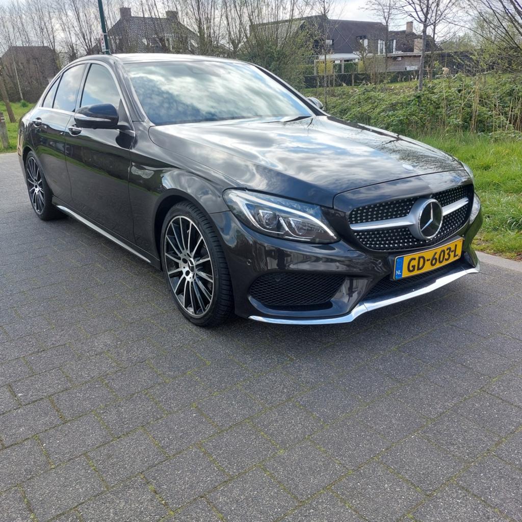 Mercedes-Benz C-Klasse C400 4MATIC 7G-TRONIC 2015 +-420pk, Auto's, 1800 kg, Bruin, Lichtsensor, Vierwielaandrijving