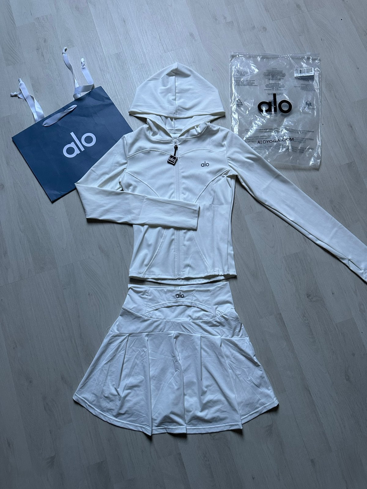 Nieuw Alo Yoga set: Goddess Legging & Rokje, Kleding | Dames, Wit, Nieuw, Ophalen of Verzenden, Fitness of Aerobics