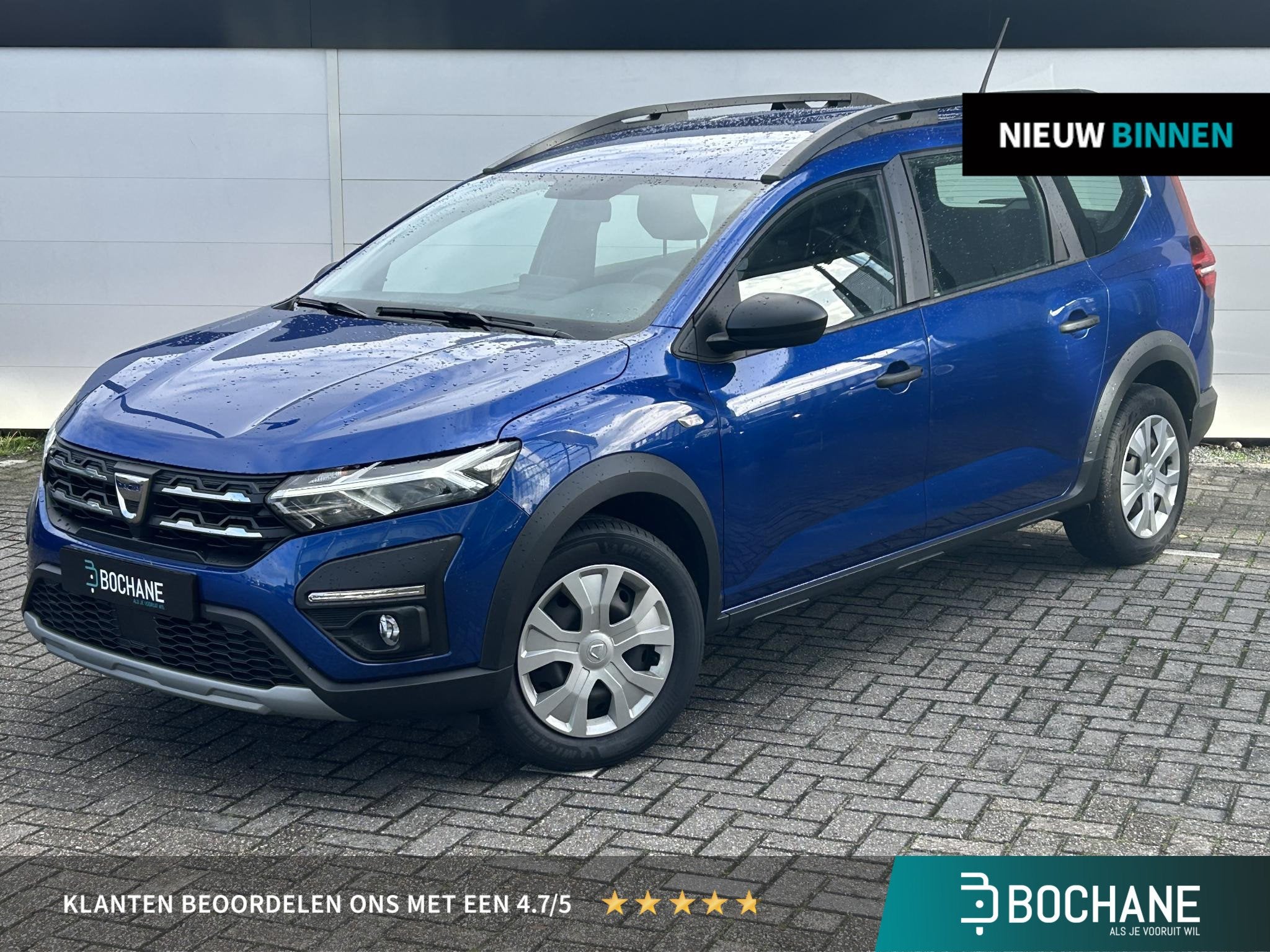Dacia Jogger 1.0 TCe 110 Expression 5p. | Airco | Cruise Con, Auto's, Stof, Met garantie (alle), Blauw, Handgeschakeld