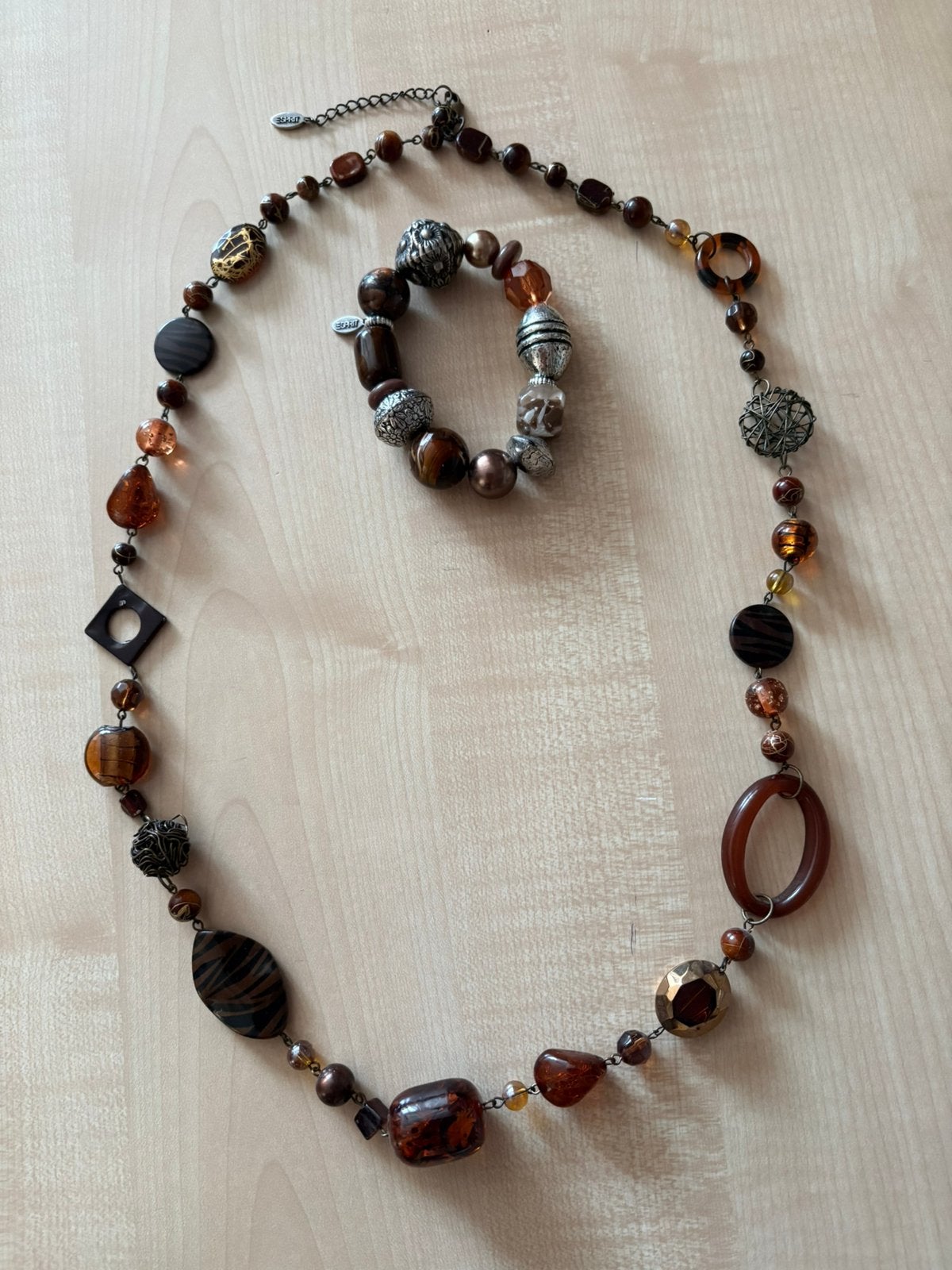 Mooie bruine aparte ketting 43cm en armband10 cm van Espirit, Ophalen of Verzenden, Zo goed als nieuw, Bruin, Overige materialen