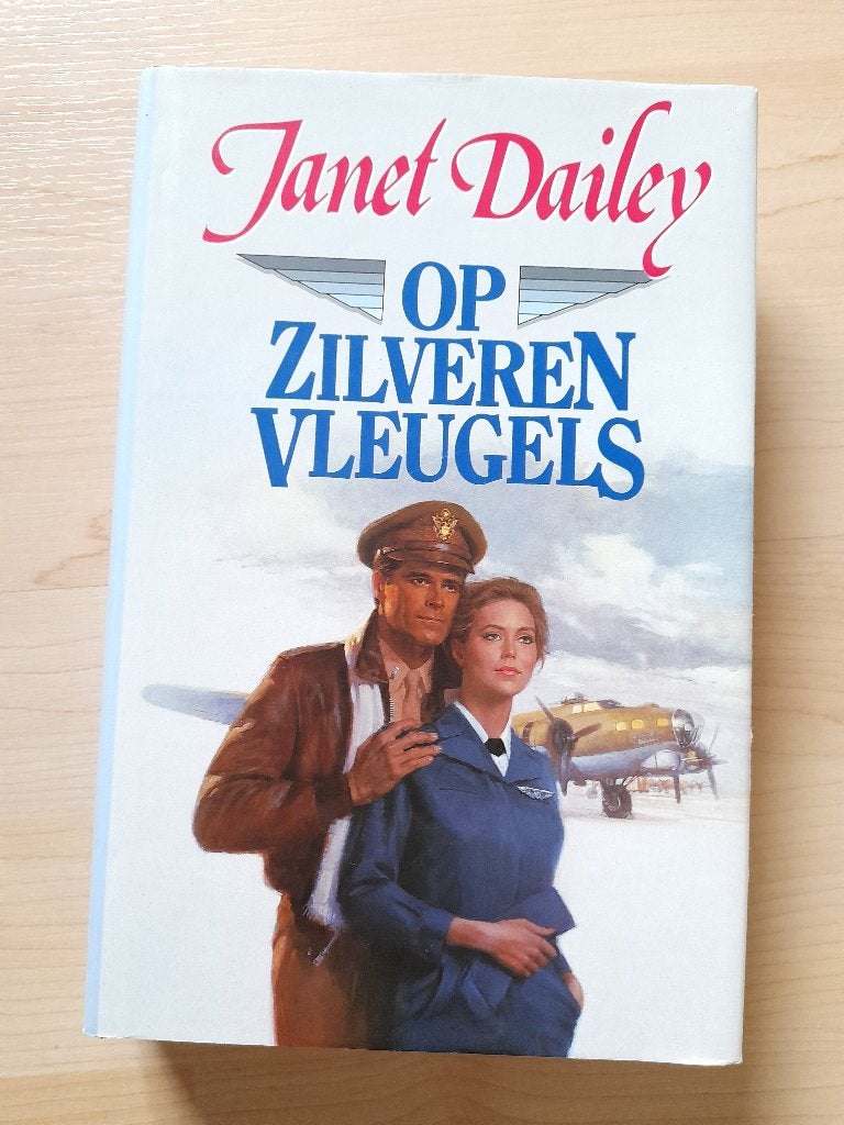 OP ZILVEREN VLEUGELS   Janet Dailey, Ophalen of Verzenden, Gelezen