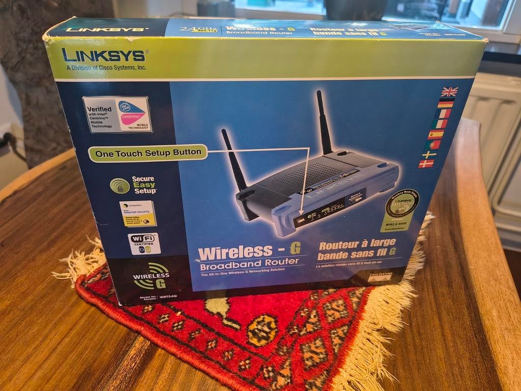 Linksys WRT54G router in originele doos met drivers!, Ophalen of Verzenden