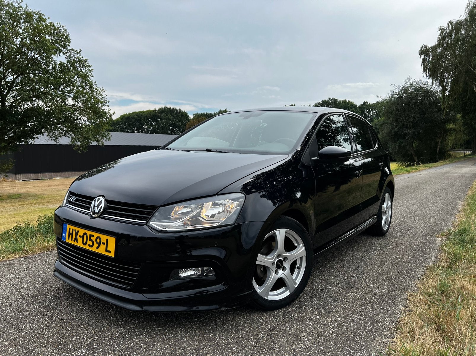 Volkswagen Polo 1.2 TSI 66KW 2016 Zwart, 40 €/maand, 4 cilinders, Zwart, Origineel Nederlands