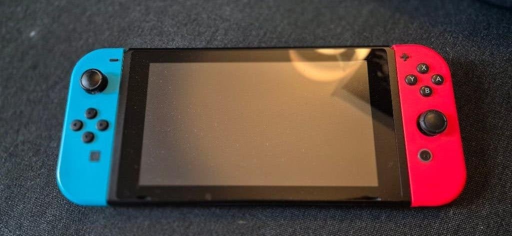 Nintendo, Ophalen of Verzenden, Zo goed als nieuw, Met 2 controllers, Switch Original