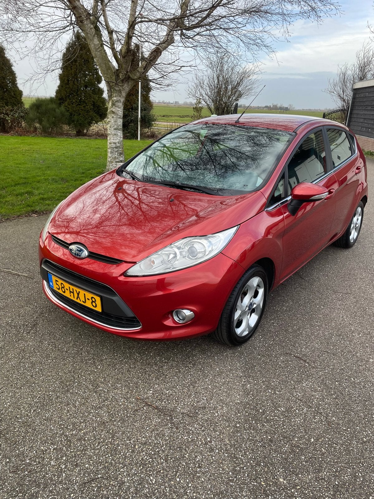 Ford Fiësta 1.25 60KW 5DR 2009 Rood met nieuwe apk, Auto's, Voorwielaandrijving, 1242 cc, Origineel Nederlands, Handgeschakeld