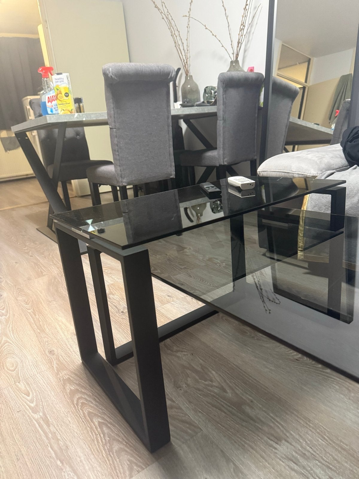 Moderne salontafel met glazen blad en metalen onderstel, 50 tot 100 cm, Ophalen of Verzenden, Glas, Zo goed als nieuw