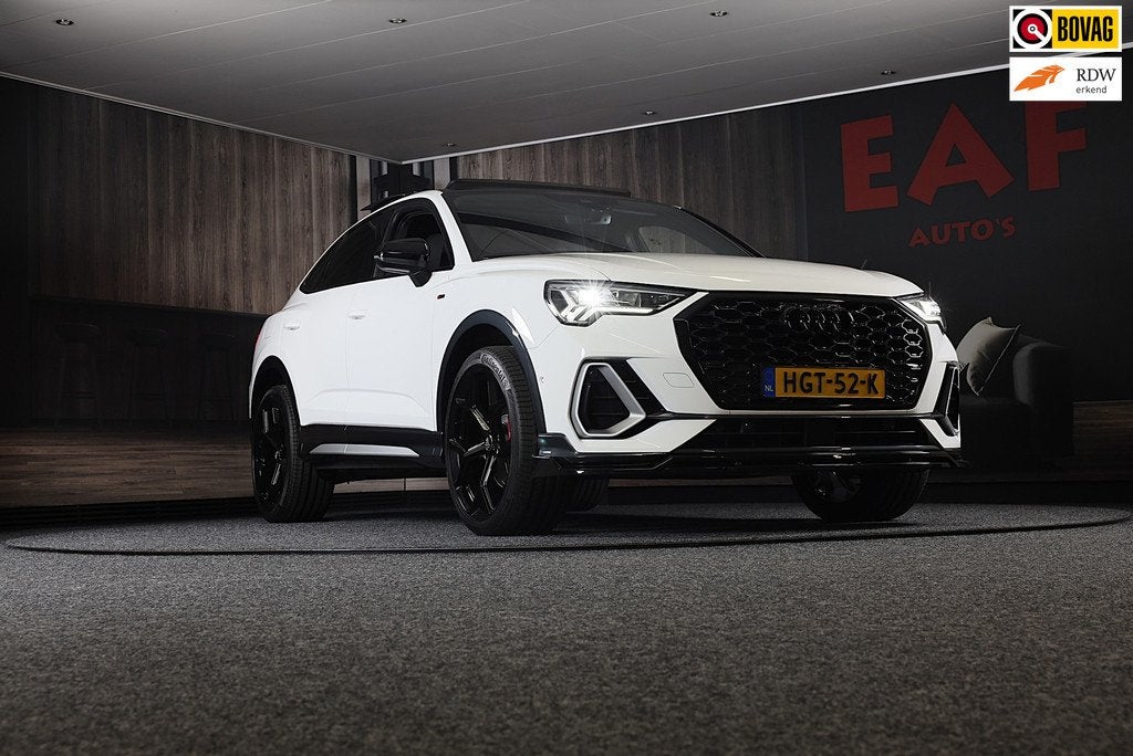 Audi Q3 Sportback 45 TFSI e RSQ3 Look / Memory / Camera / Ac, Auto's, Gebruikt, Euro 6, Leder en Stof, Wit