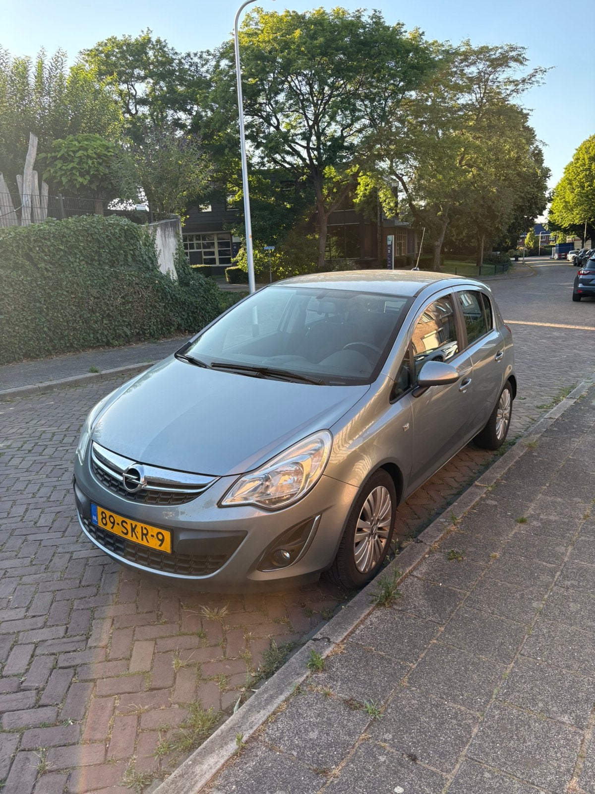 Opel Corsa 1.2 16V 5D 2011 Grijs, Auto's, Opel, Voorwielaandrijving, 1063 kg, 4 cilinders, 1229 cc