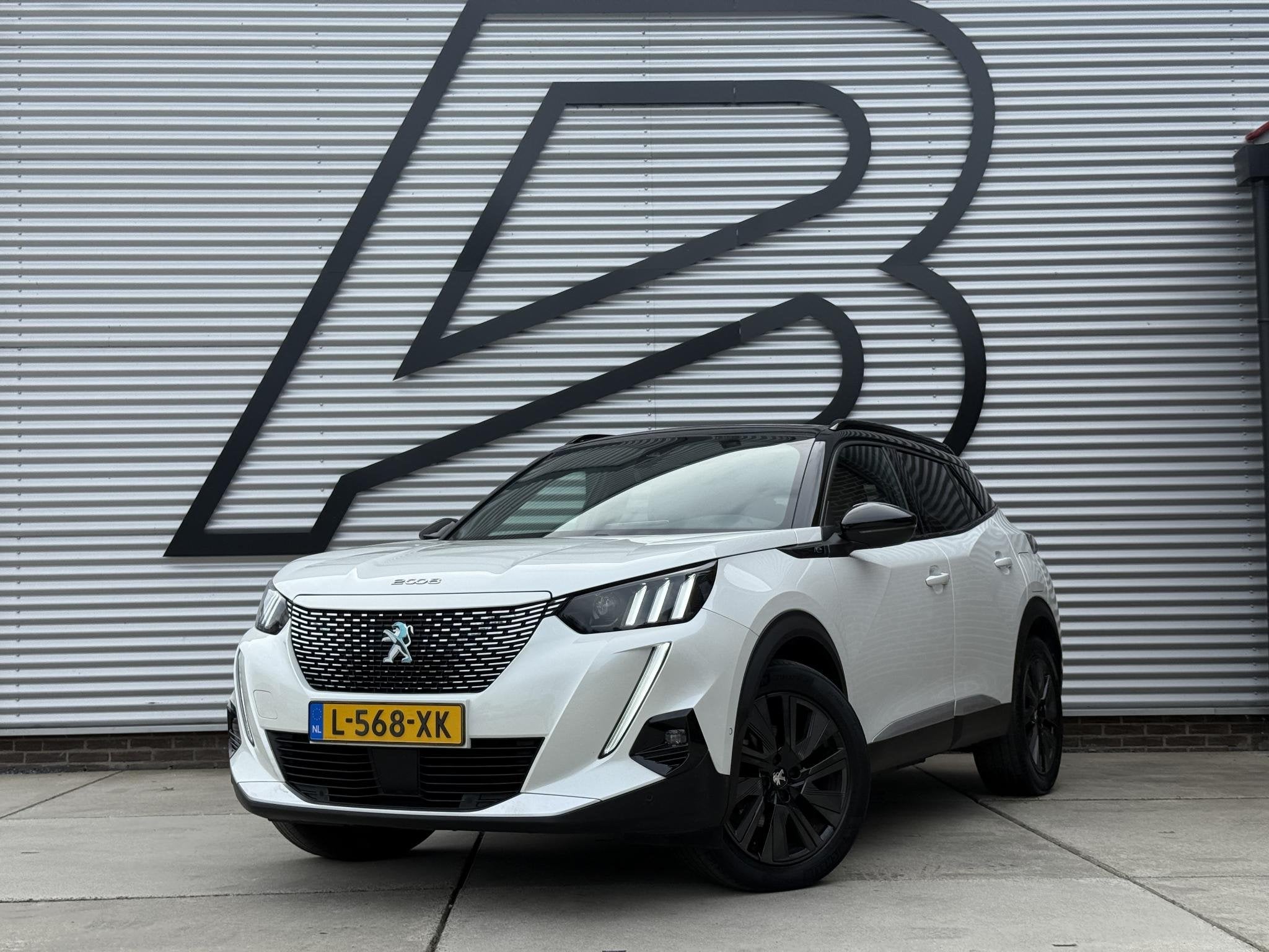 Peugeot e-2008 EV GT Pack 50 kWh SoH 88,63% 1e Eigenaar|Navi