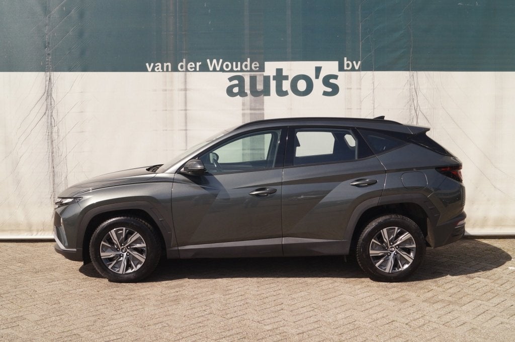 Hyundai Tucson 1.6 T-GDI HEV i-Motion -NAVI-ECC-CAM-TREKHAAK, Stof, Gebruikt, Euro 6, 4 cilinders