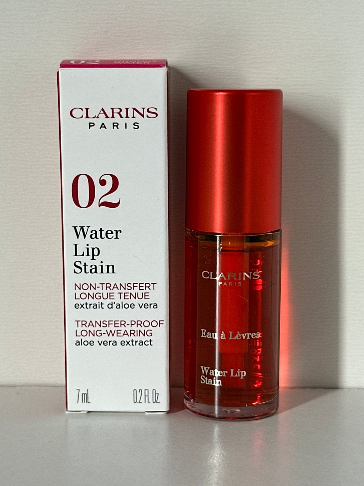 Clarins Water Lip Stain 7 ml #02 Orange Water#, Ophalen of Verzenden, Nieuw, Lippen, Make-up