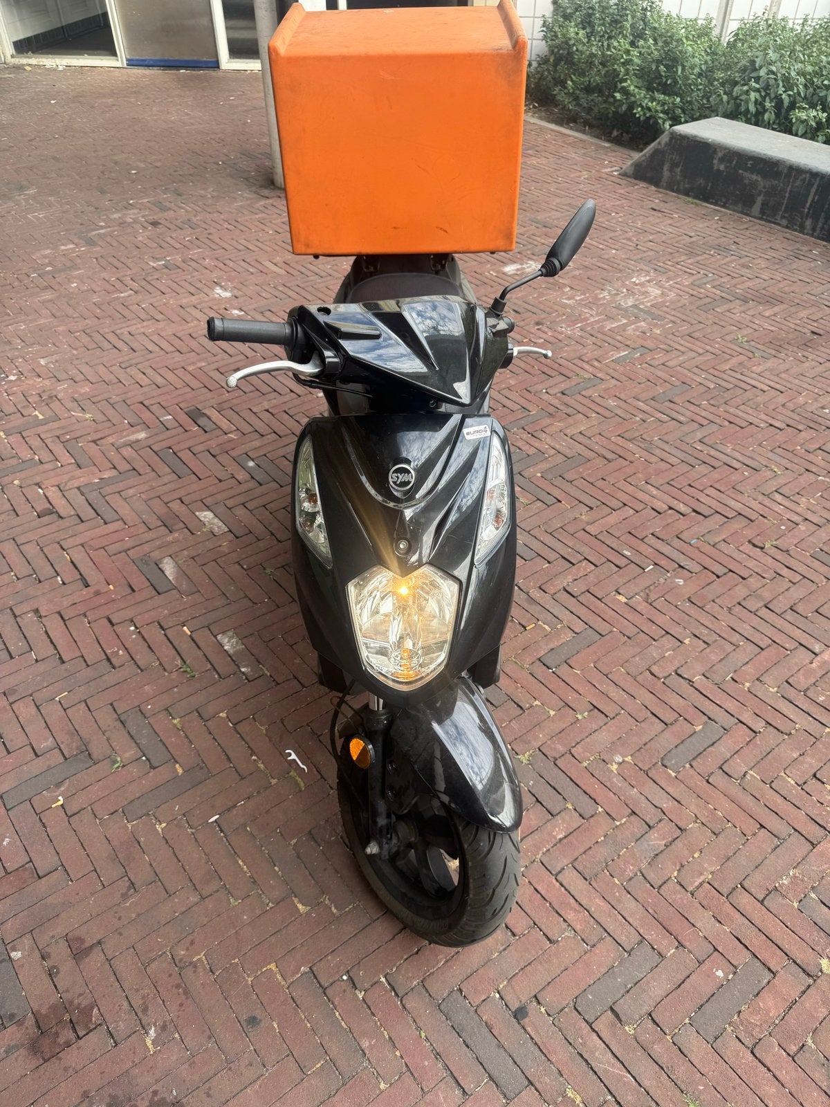 Kymco x pro bezorgscooter, Ophalen