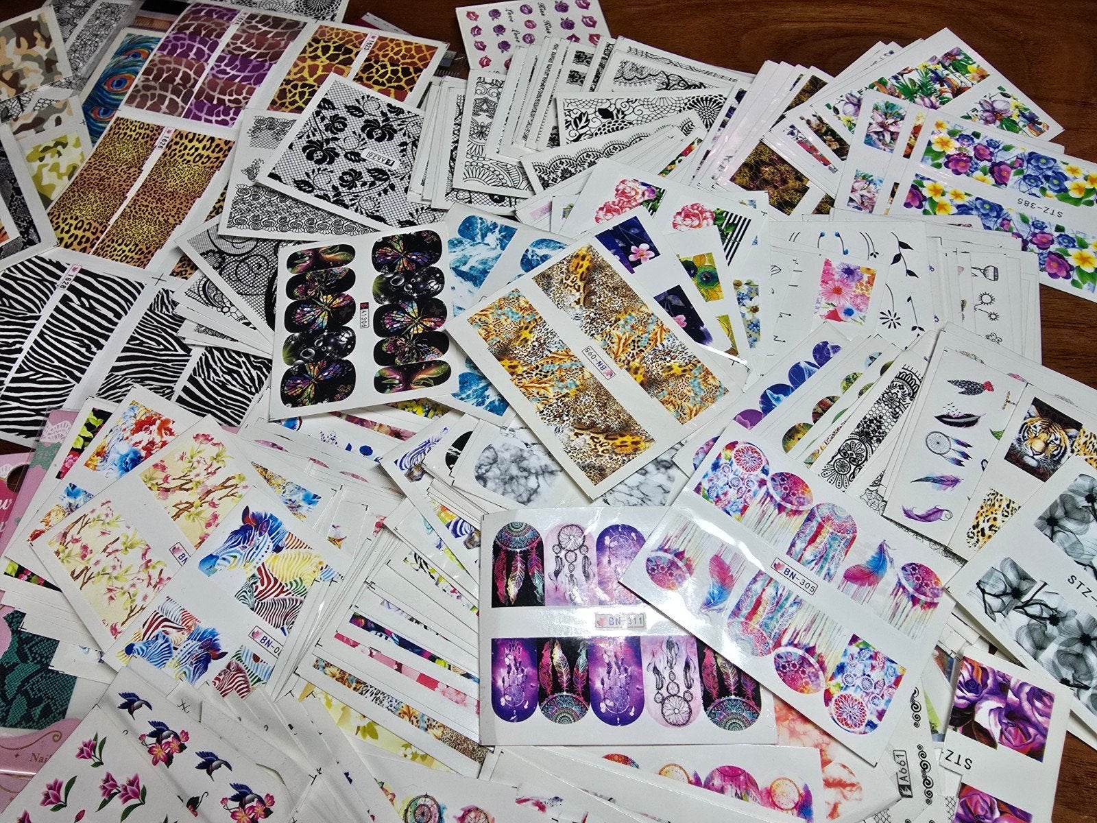 Grote collectie nagelstickers / water decals, Ophalen of Verzenden, Zo goed als nieuw