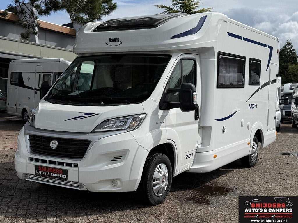 Mc louis mc4 237 met maar 7700 km face to face, Caravans en Kamperen, Campers, Airconditioning, 6 tot 7 meter, Bedrijf, 6 tot 7 meter