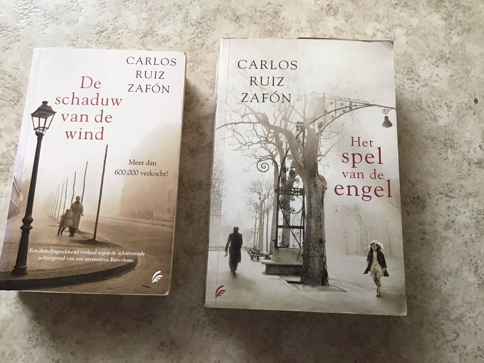 Carlos Ruiz Zafón: De schaduw van de wind & Het spel van de, Ophalen of Verzenden, Gelezen, Europa overig