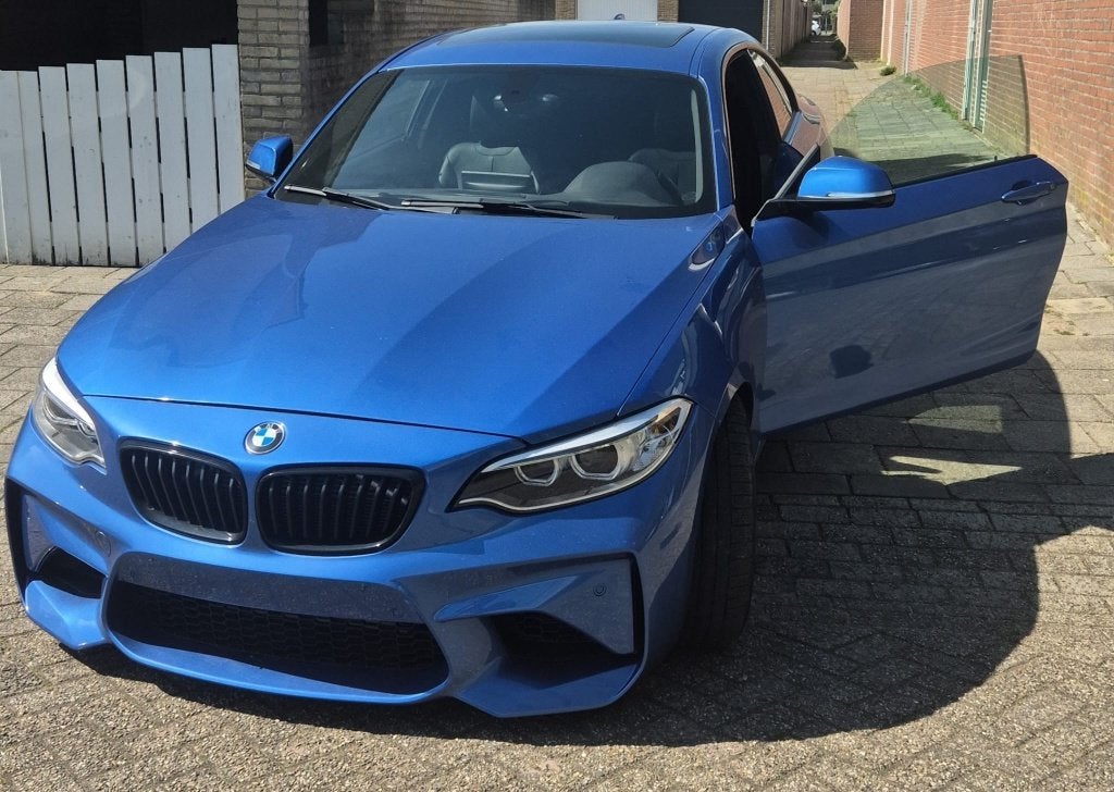 BMW m235i - 50k km 2016 US import, Automaat, Achterwielaandrijving, Zwart, Blauw