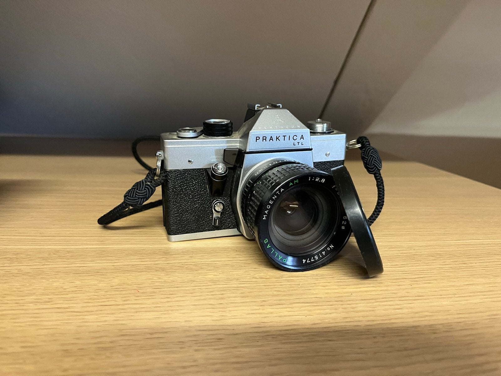Praktica LTL Spiegelreflexcamera met Magenta AM 1:2.8 lens, Audio, Tv en Foto, Fotocamera's Analoog, Ophalen of Verzenden, Gebruikt