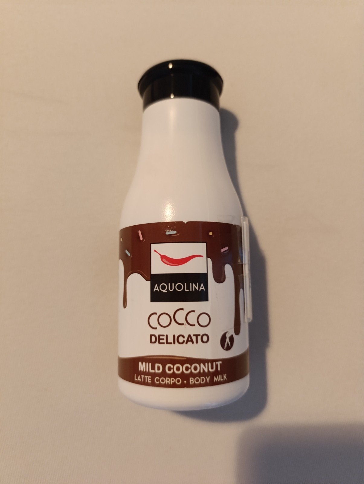 Bodylotion Aquolina kokos 250 ml fles, Ophalen of Verzenden, Nieuw, Bodylotion, Crème of Olie