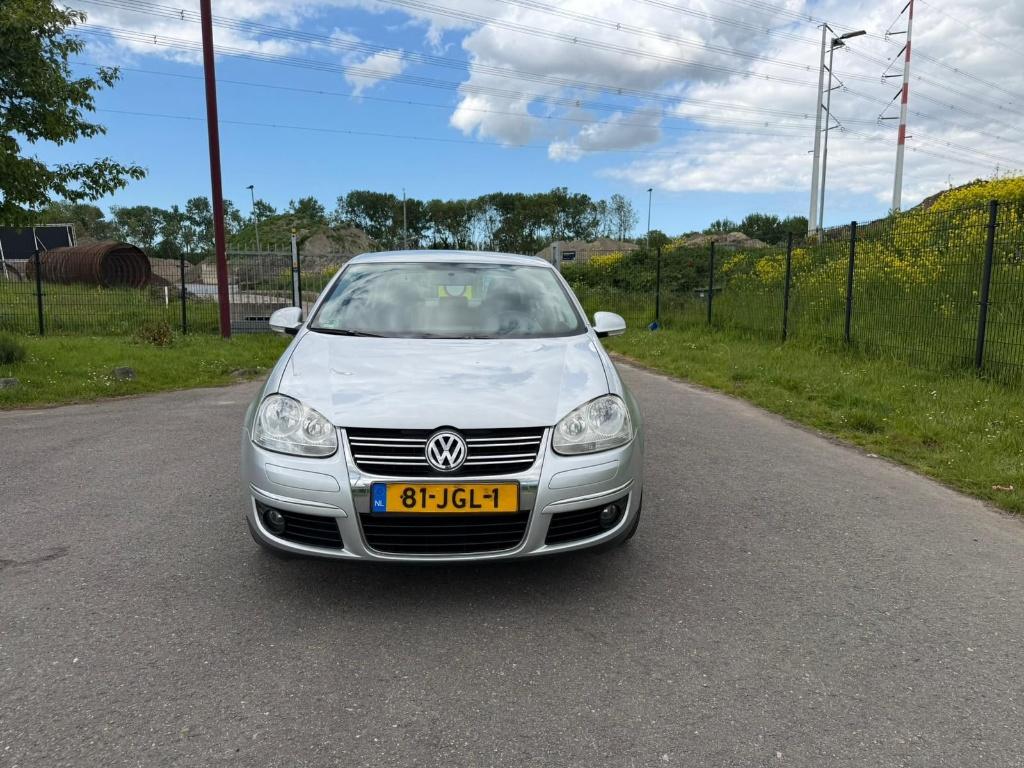 Volkswagen Jetta 1.4 TSI 90KW Dsg7 Automatisch 2009 Grijs, Auto's, 1304 kg, Airbags, 4 cilinders, 122 pk