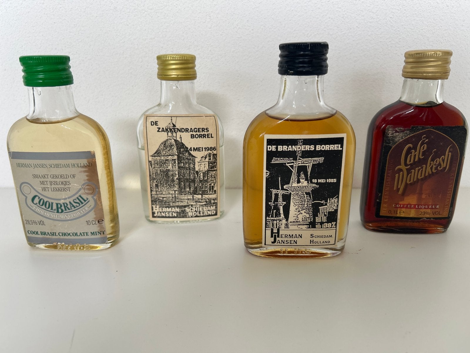 Oude miniatuur drankflesjes Herman Jansen (4 stuks), Ophalen of Verzenden, Gebruikt