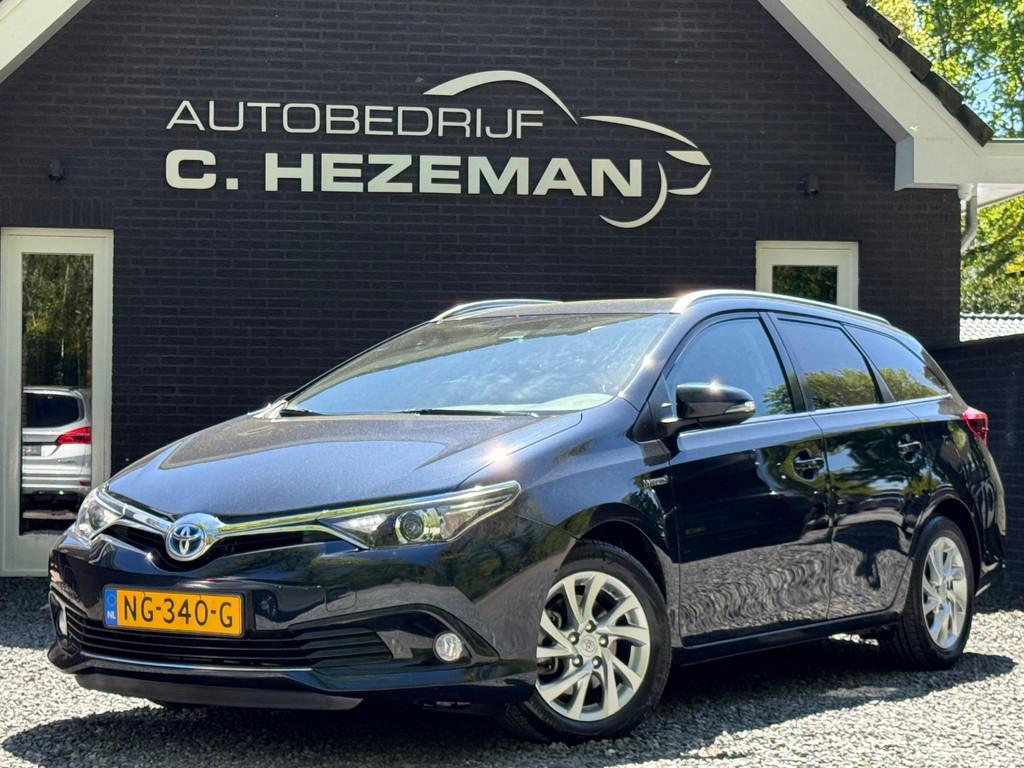Toyota Auris Touring Sports 1.8 Hybrid Dynamic 39dkm NAP NIE, Auto's, 28 km/l, Gebruikt, Alcantara, Origineel Nederlands