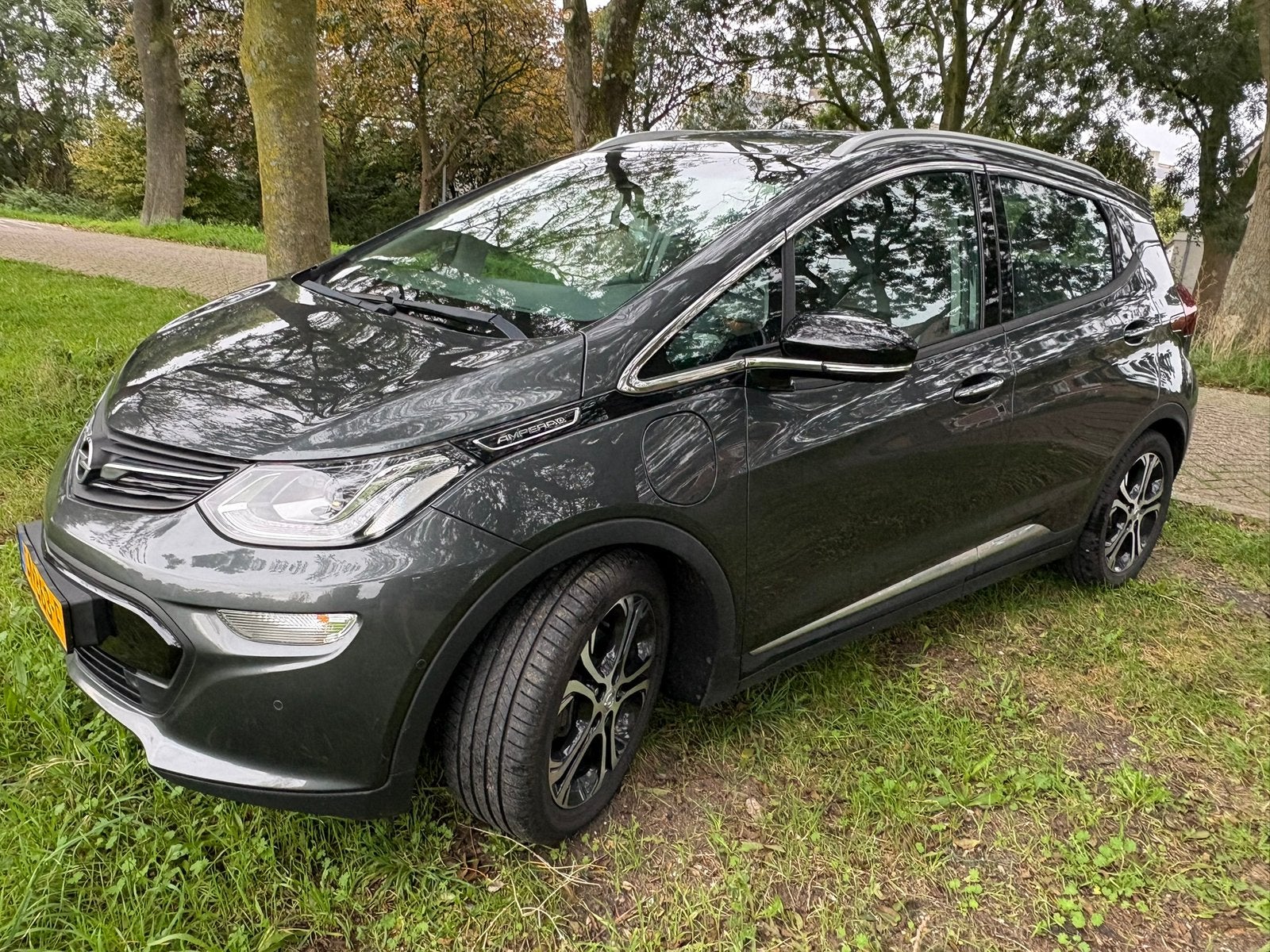 Opel Ampera-e business exec 60-kWh 2018 Grijs, Auto's, Dealer onderhouden, 69 min, 150 pk, Origineel Nederlands