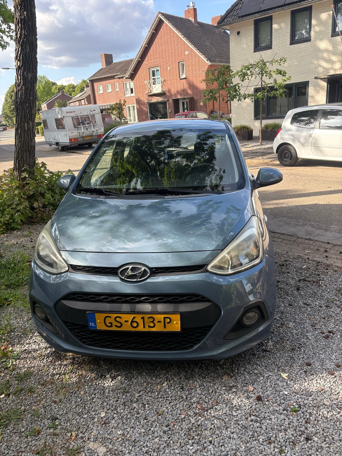 Hyundai i10 1.0i 66pk 2015 Blauw, Auto's, Voorwielaandrijving, 31 €/maand, 23 km/l, Origineel Nederlands