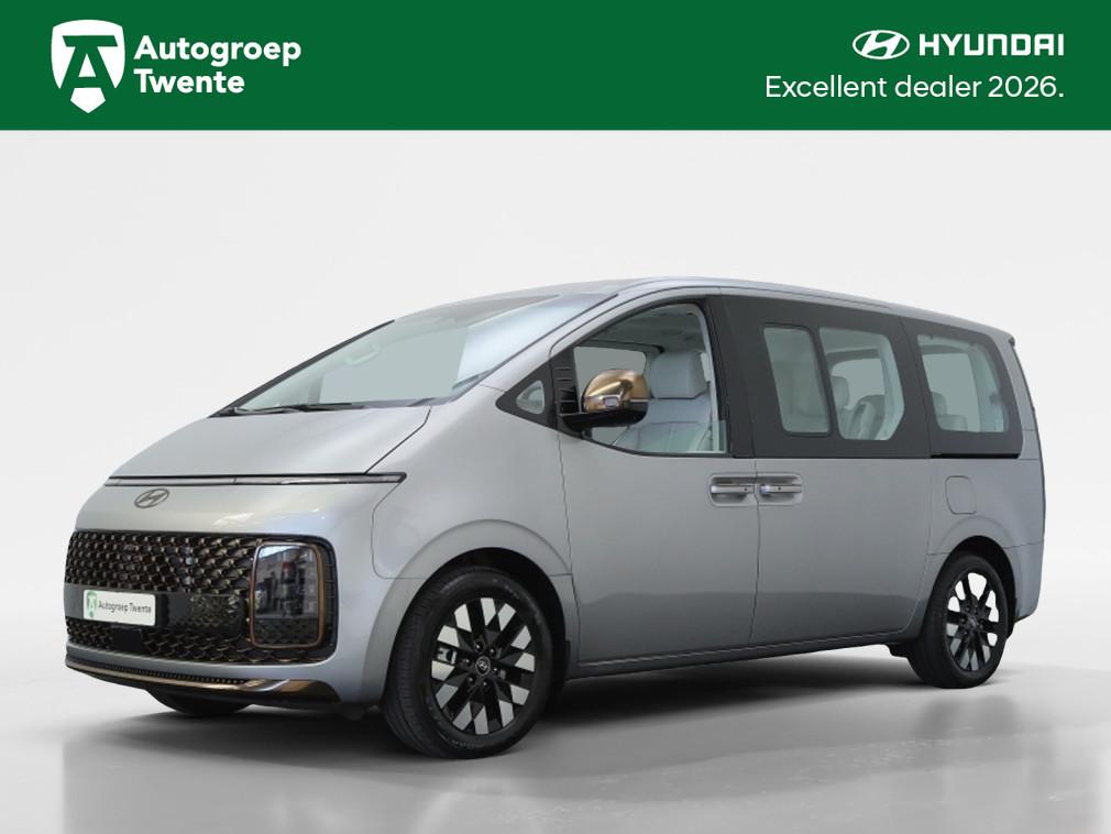 Hyundai Staria 1.6 T-GDI HEV | Luxury 7 persoons | Hybride |, Auto's, Bestelauto's, 12 maanden, 4 cilinders, 7 stoelen, Leder